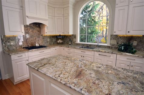 There are limitless ways to get creative with black granite and other remodeling materials. Granite Kitchen Countertops w/ Full Height Backsplash ...