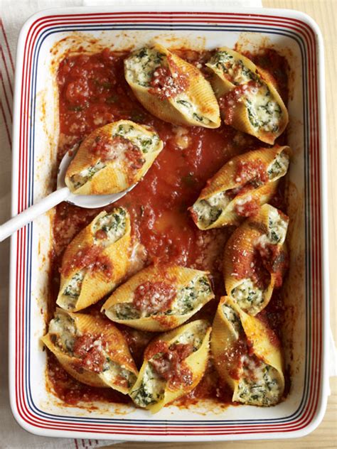 Stuffed shells are a classic, hearty italian dinner that never goes out of style; Sausage, Spinach, and Cheese Stuffed Shells Recipe