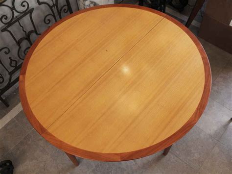 A small bench with nice cushions and a few throw pillows. Maple Mid Century Modern Round Table with leaf and 5 ...