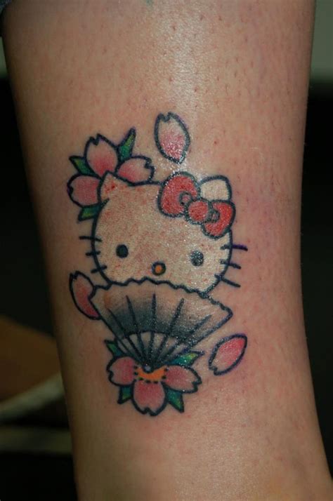The designs range from tiny to moderately large sizes and come in brilliant hues. 16 hello kitty tattoo design - EntertainmentMesh