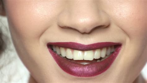 Mouth of girl smiling, makeup. White teeth and red lipstick. Stock ...