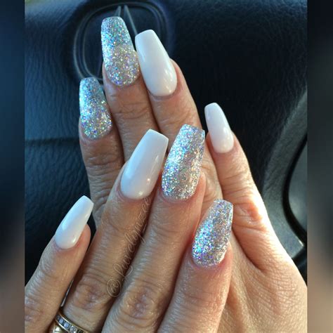 Acrylic nails, White Acrylic Nails, Silver and white nails ... These acrylic nail designs are glamorous and unique, giving you the inspiration you'll need to create your own fabulous designs for that special occasion.