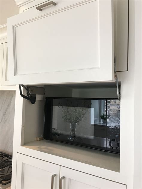 Clever Cabinet To Hide Microwave Large Enough To Accommodate A
