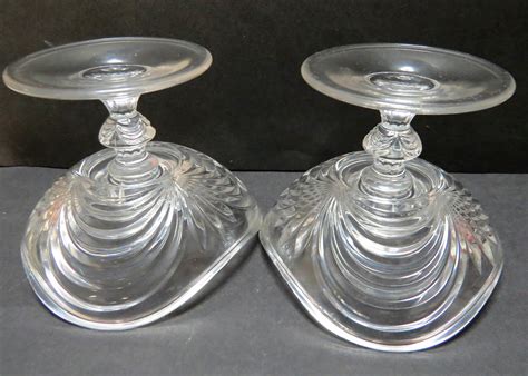 Maybe you would like to learn more about one of these? Glass Footed Candle Holders | Collectors Weekly