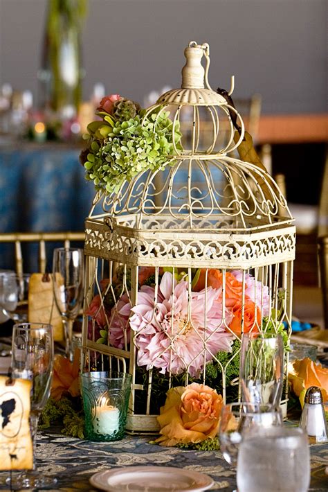 birdcage centerpiece with pink dahlias bird cage centerpiece wedding bird cage centerpiece