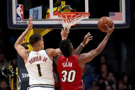 Hypoxemia pao 2 /fio 2 in mmhg on 100% oxygen for at. Murray Scores 21 Points, Nuggets Beat Heat 109-89