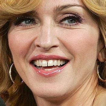 Madonna and son david banda, 8, hit grammys 2014 red. Beauty and Beyond....: Braces: Geek Chic or Ugly Betty?