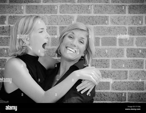 Mother Daughter Embracing Girl Kissing Black And White Stock Photos