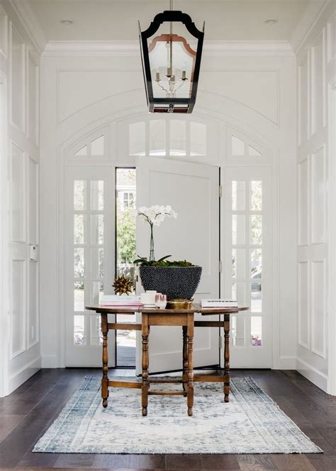 French Inspired Entryway With Arched Windows And Perfect Finish Work