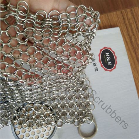 Manufacture and exporter of stainless steel wire mesh,welded wire mesh,concertina razor wire,mesh fence,window screen,steel grating,expanded metal in china,high quality and low price. 7"x 7" Metal Mesh Drapery / Stainless Steel Chain Mail Wire Mesh Scrubbers For Cast Iron Cookware