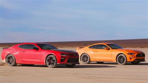 The m6's are a little slower, but should be close m6 vs m6. Mustang GT vs Camaro SS 1LE: Desert Drag Race Showdown!
