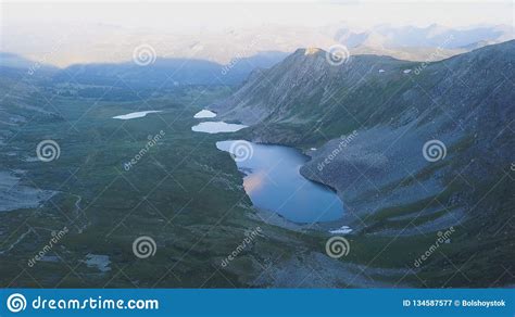 Aerial View On Mountain Peak With Lake Background Amazing Mountains