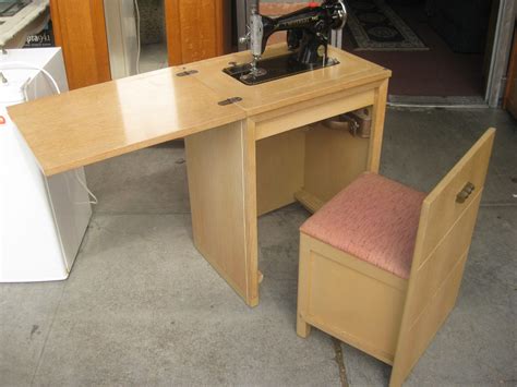 Huge sale on sewing machine cabinets tables now on. UHURU FURNITURE & COLLECTIBLES: SOLD - Universal Sewing ...