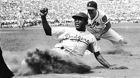 Jackie robinson was the first african american to play in major league baseball. pictures - Jackie robinson's bio