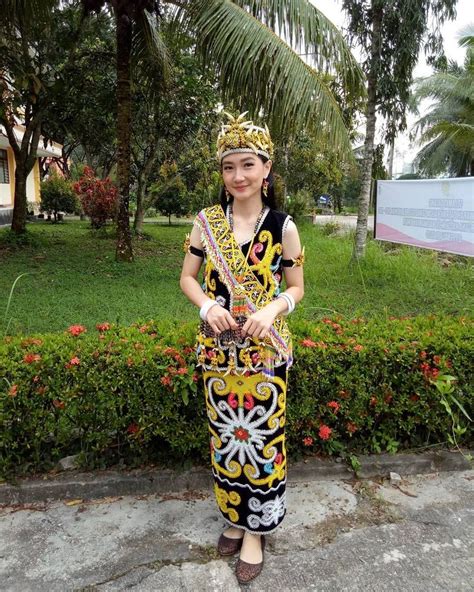 Dayak Girl Wearing Traditional Costume Indonesia