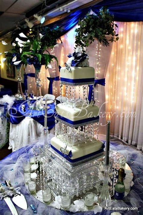 Check out our square wedding cake selection for the very best in unique or custom, handmade pieces from our party décor shops. Three tier square modern wedding cake with royal blue ...