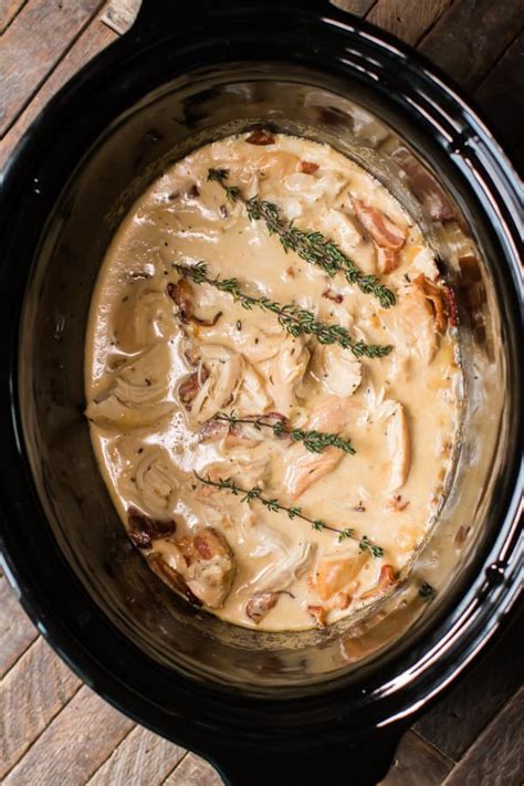 In a saucepan, pour 2 cups of broth from crock pot. Slow Cooker Chicken with Bacon Gravy - The Magical Slow Cooker