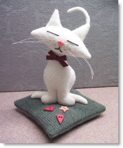 Start with the cat head. Free Project! Kitty Kat Pincushion pattern & instructions ...