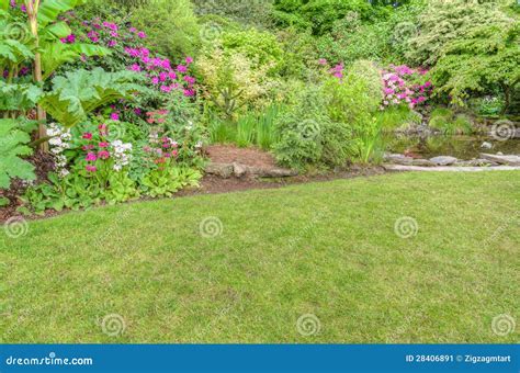 Landscaped Garden Scene With Blooming Shrubs Stock Image Image Of