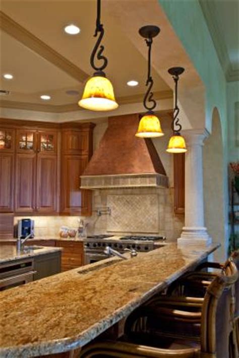 Tuscan style kitchens sport characteristic warm earth tones along with natural materials to produce a worn out look. Tuscan Kitchen Colors and Paint Techniques | LoveToKnow