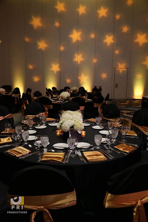 Custom Star Gobo Lighting Projected On A Wall During An Awards Ceremony