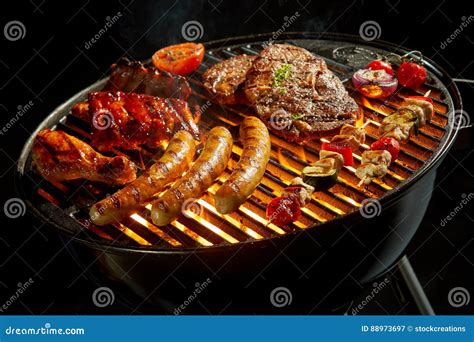 Assorted Meat Grilling Over The Fire At A Bbq Stock Image Image Of