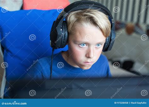Teenage Boy Playing Computer Games On Pc Stock Photo Image Of