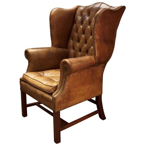 Leather wing chairs look great accompanying your new chesterfield sofa. Tufted Leather Wingback Library Chair at 1stdibs