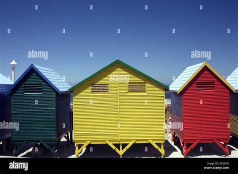 Colorful Beach Huts At The Sandy Beach Of St James With Blue Sky False
