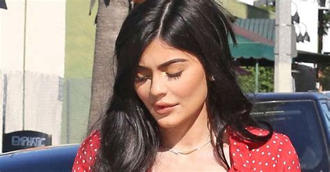 Kylie Jenner Flashes Her Spanx As The Wind Flips Her Skirt Up Revealing