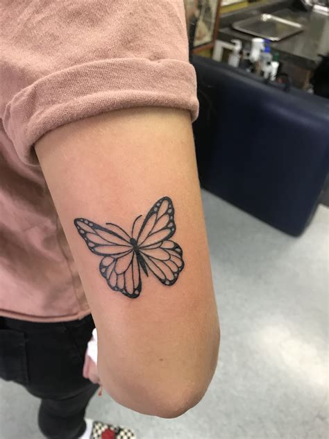 Simplistic Butterfly Tattoo On Arm