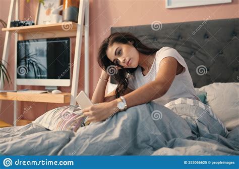 But First Let Me Take A Selfie A Young Woman Taking Selfies In Bed At Home Stock Image