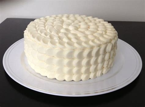 Blend in the sugar, one cup at a time, beating well after each addition. how to decorate a cake with cream cheese frosting ...