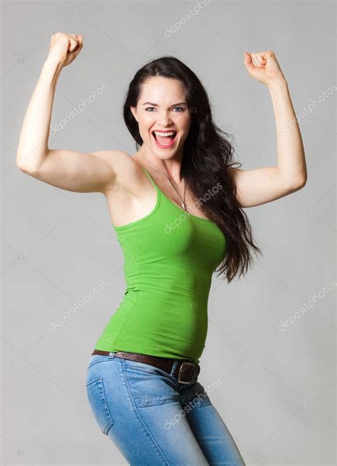Happy Woman Flexing Muscles — Stock Photo © Jaykayl 10389956