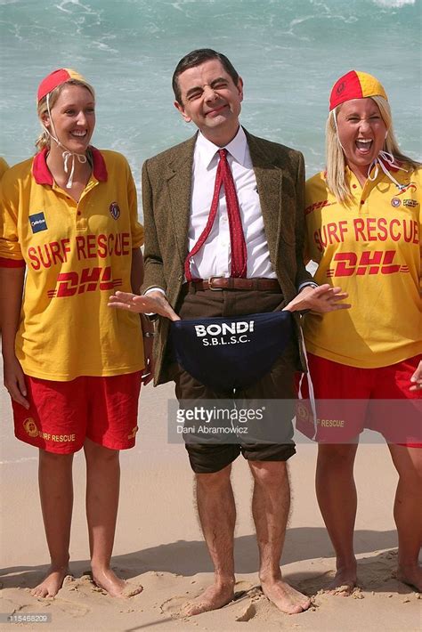 Rowan Atkinson As Mr Bean With Lifeguards During Mr Bean Comes To