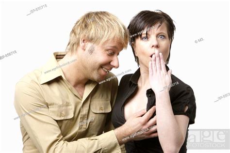 Blonde Man Touching The Breast Of A Woman Stock Photo Picture And Rights Managed Image Pic