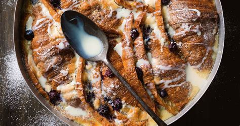 The dark and light contrasting bands of chocolate are particularly pretty against the golden. Blueberry and white chocolate bread and butter pudding