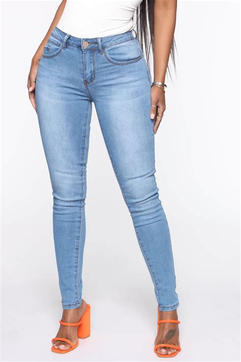 Makenzie Mid Rise Skinny Jeans Light Blue Wash Fashion Nova Jeans