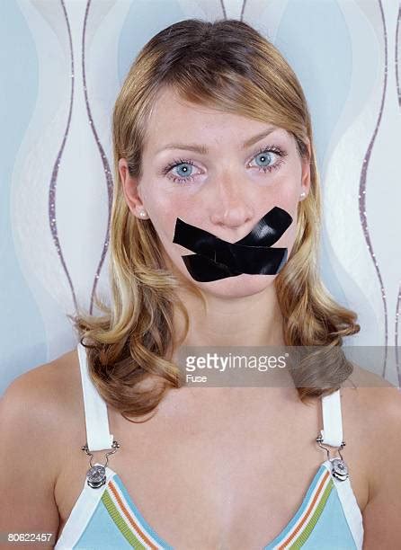 Woman Taped Mouth Photos Et Images De Collection Getty Images