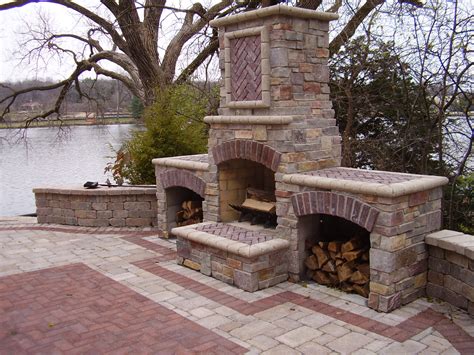 Landscape lighting outdoor lighting outdoor decor fire pit landscaping wood burning fire pit landscape services brick patios cool landscapes the fire feature is a very popular landscape feature. landscape outdoor fireplace - Benson Stone