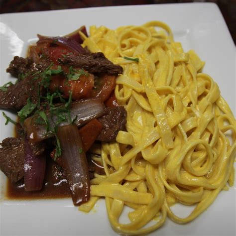 Fettuccine A La Huancaina Con Lomo Peruvian