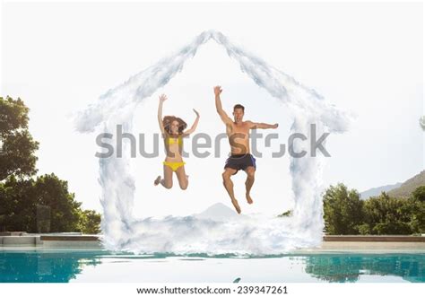 Cheerful Couple Jumping Into Swimming Pool Stock Photo Edit Now 239347261