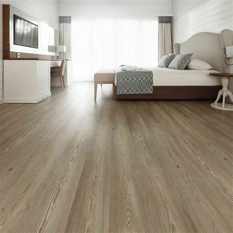 Install laminate flooring planks by inserting one short end into the other at an angle, approximately 20 degrees, and pressing down. Cheap Laminate Flooring: Reviews and Buyer's Guide