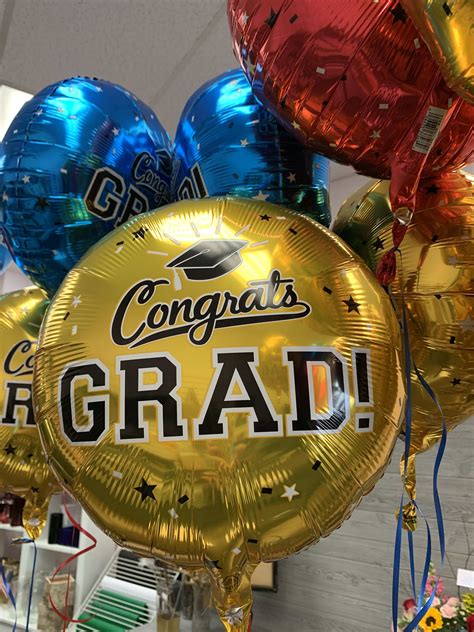 Graduation Mylar Balloons In Lawrenceburg In Artistic Floral