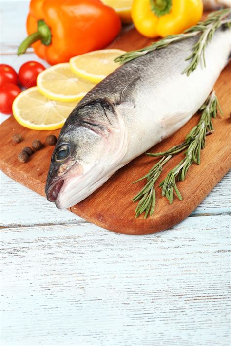 Premium Photo Fresh Raw Fish And Food Ingredients On Table