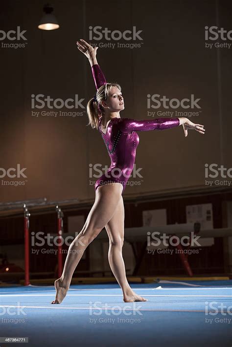 Portrait Of Young Gymnasts Competing In The Stadium Stock Photo