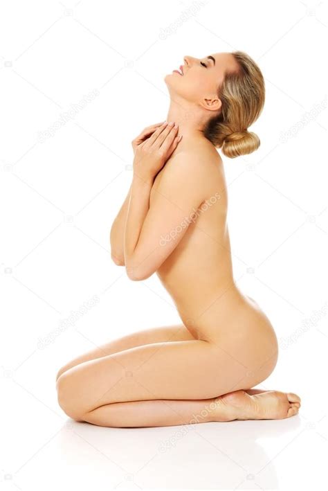 Naga kobieta siedzi na podłodze Zdjęcie stockowe piotr marcinski