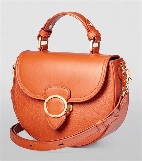 Aspinal Of London Orange Leather Saddle Bag Harrods Uk