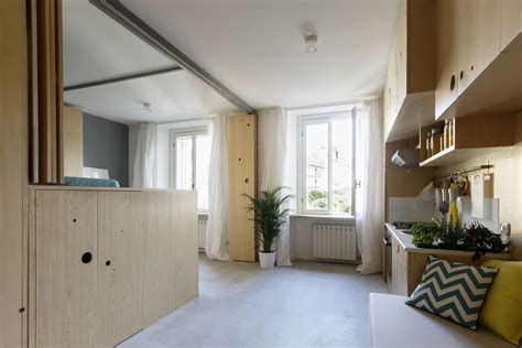 Small Studio Apartment With A Clever Movable Partition System