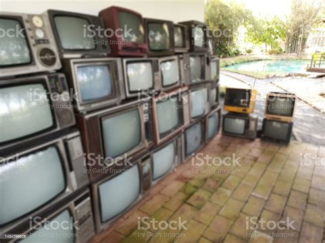 A Pile Of Old Tvs That Have Been Used In A Variety Of Brands With Both